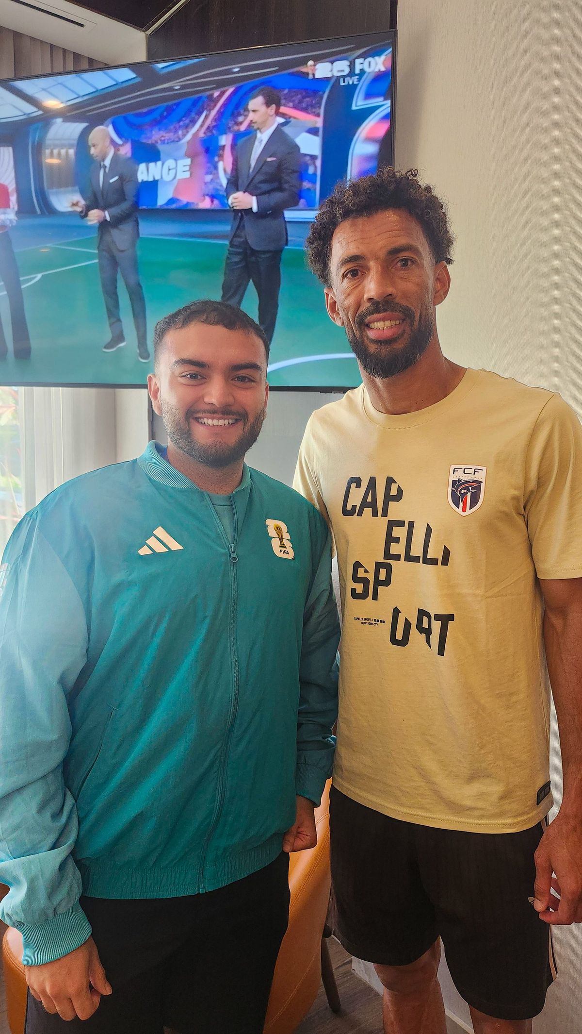 Santiago Reyes with Vozinha during the FIFA World Cup 2026